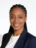 AI-generated professional headshot by still., made from the selfie beside it