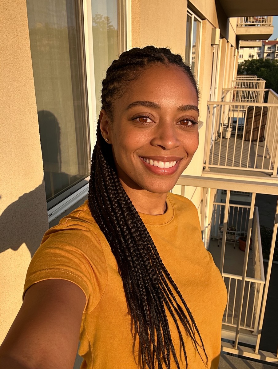 Woman in her thirties, the selfie uploaded to still.