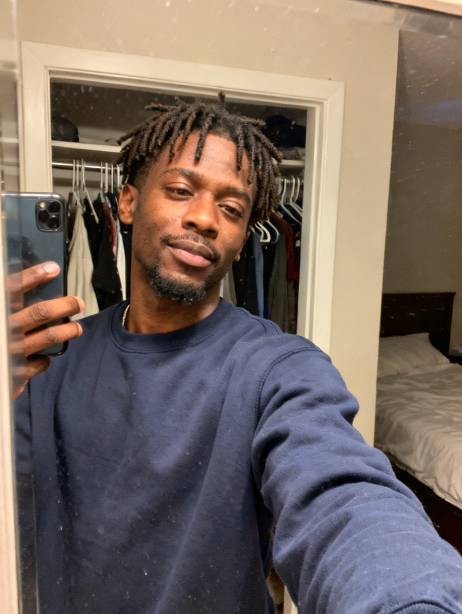 The selfie this headshot was made from