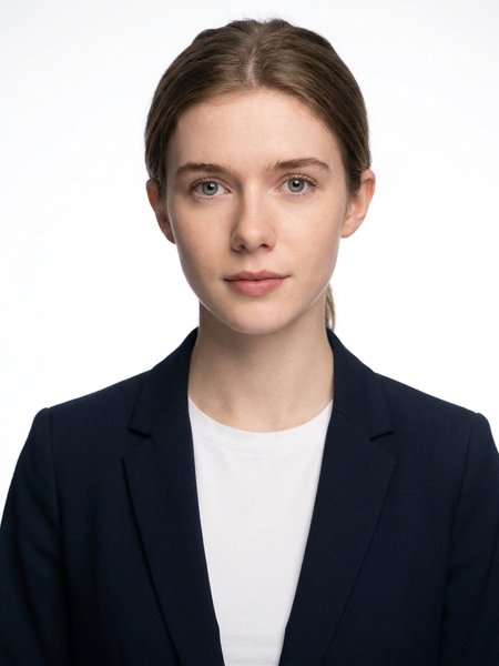 AI-generated professional headshot by still., made from the selfie above