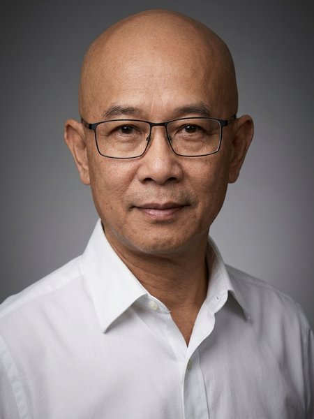 AI-generated professional headshot by still., made from the selfie above