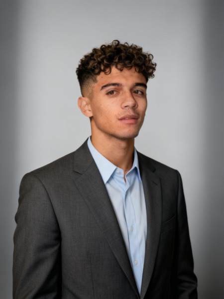 AI-generated professional headshot by still., made from the selfie above