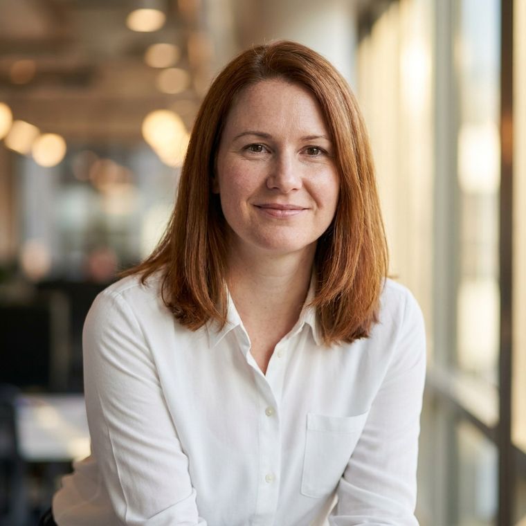 Portrait with a blurred office interior behind