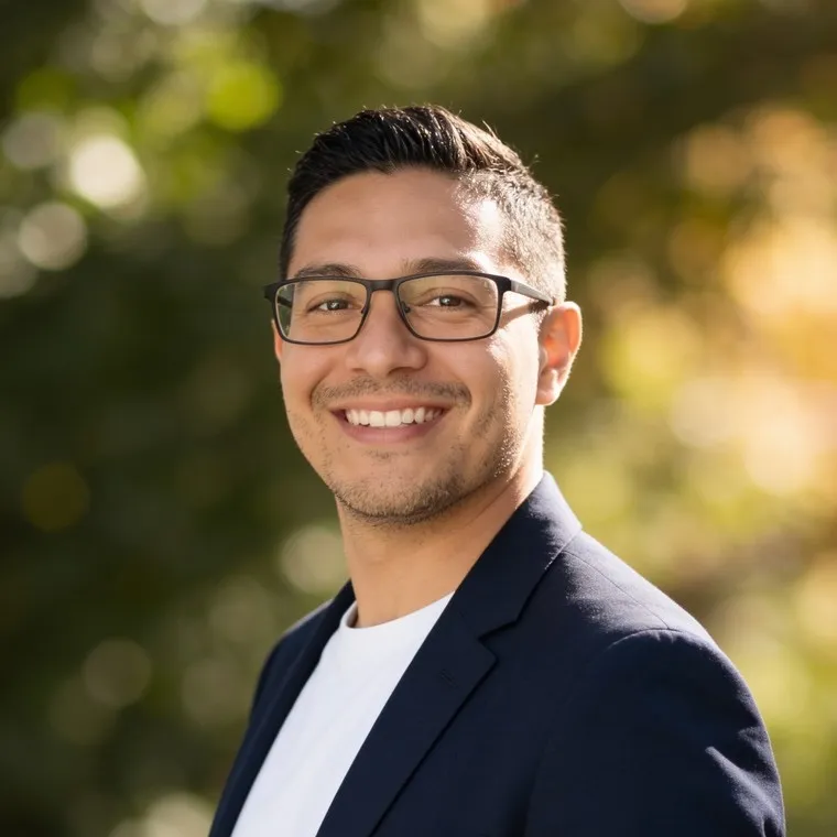 Man in his mid thirties in a professional headshot made by still.