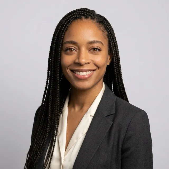 Woman in her thirties in a professional headshot made by still.