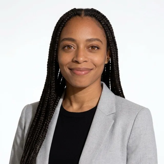 Woman in her thirties in a professional headshot made by still.